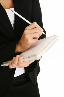 Researcher with Pen & Pad